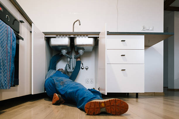 Professional Plumbing technician working in Kensington, MD